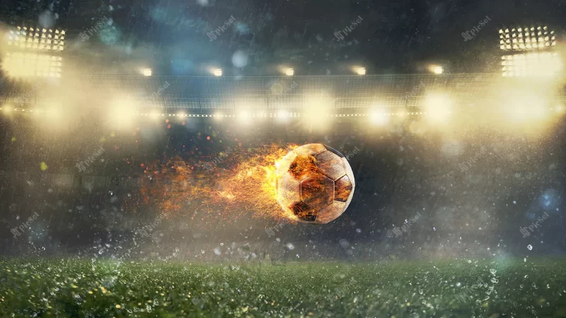 close up fiery soccer ball kicked with power stadium / توپ آتشین فوتبال در ورزشگاه