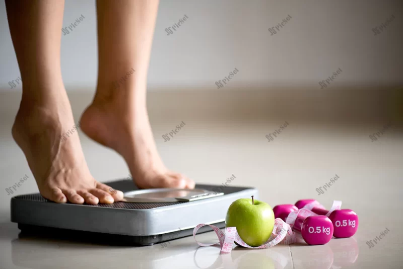 female leg stepping weigh scales with measuring tape / ترازوی وزنه برداری نوار متر اندازه گیری