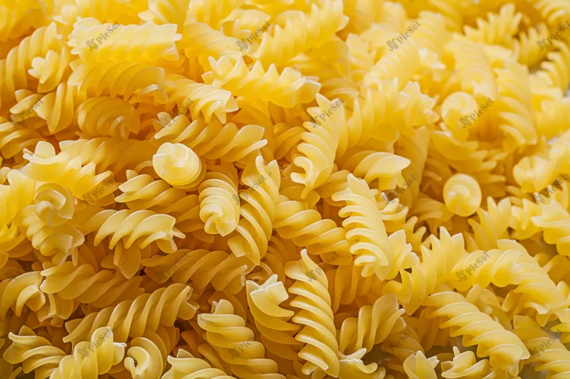 shortcut spiral pasta backdrop food drink concept / پس زمینه پاستا مارپیچی ماکارونی